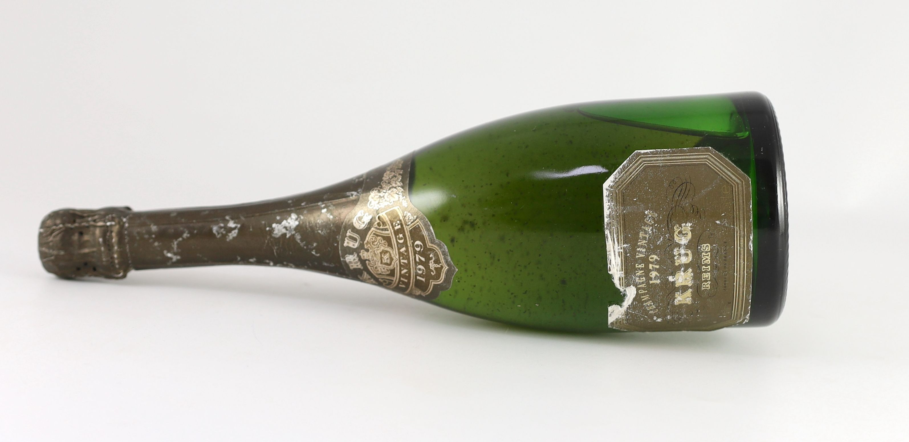 A bottle of Krug 1979 vintage champagne, 32cm high